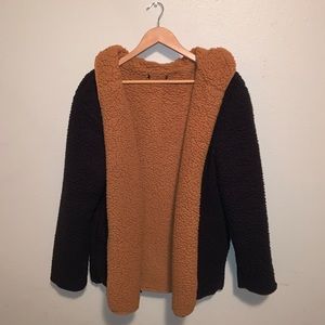 Oversized Reversible teddy coat in black and brown